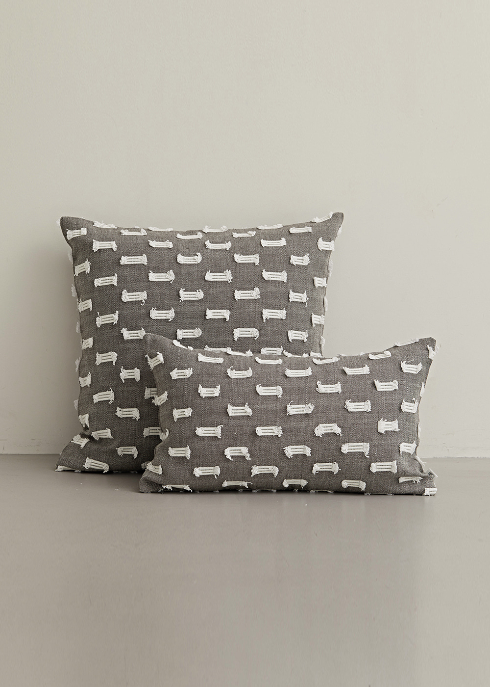 fringe cushion gray